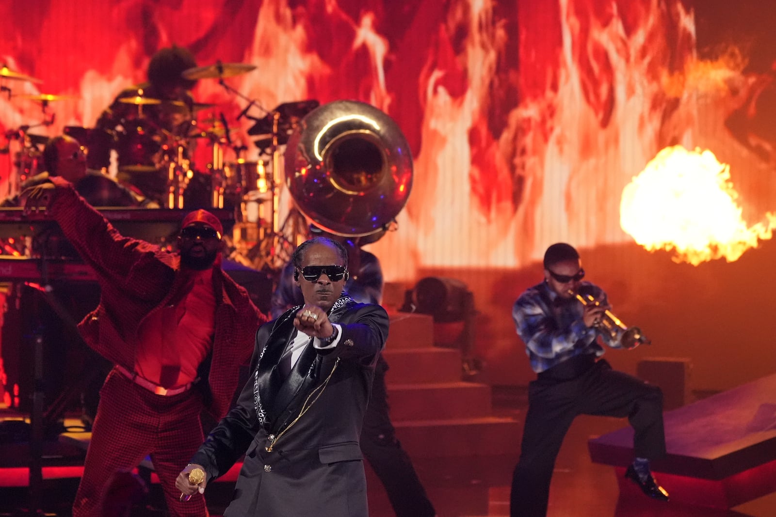 Snoop Dogg, center, performs a medley during the BET Awards on Monday, June 9, 2025, at the Peacock Theater in Los Angeles. (AP Photo/Chris Pizzello)