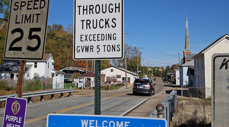 A sign, visible at the entrance to Tremont City on Upper Valley Pike, warns that no trucks over five tons are permitted. Tremont City Mayor Tony Flood II and Police Chief Chad Duncan said the ordinance was due to safety concerns. BILL LACKEY/STAFF