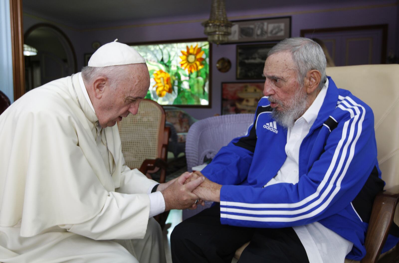 FILE - Pope Francis, left, meets Fidel Castro in Havana, Cuba, Sunday, Sept. 20, 2015. (AP Photo/Alex Castro, file)