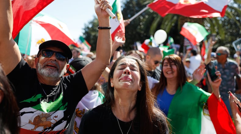 Demonstrators gather in reaction to the U.S. and Israeli strikes on Iran on Saturday, Feb. 28, 2026, in Los Angeles. (AP Photo/Caroline Brehman)