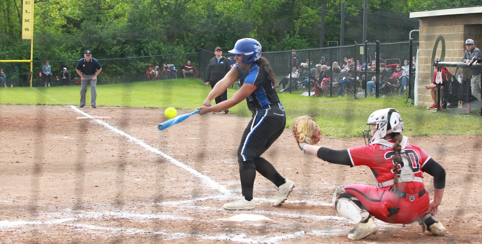 Whitni Enis swings for Miami East in the Division V softball regional semifinals at Centerville May 28, 2025.