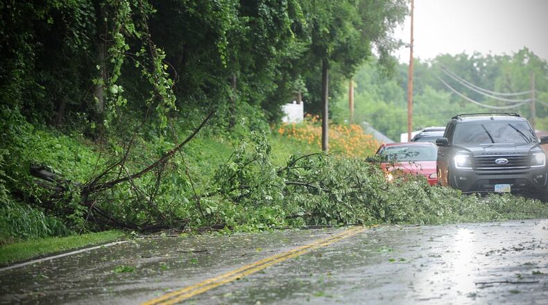 Heavy rain and strong winds hit the Fairborn area Tuesday afternoon causing branches to come down. MARSHALL GORBY\STAFF