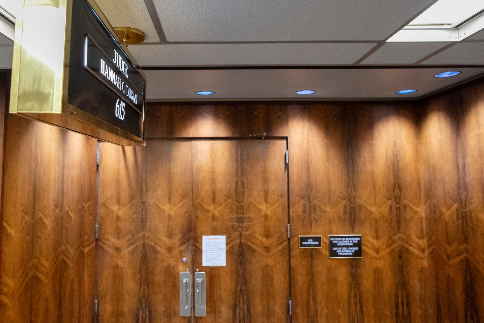 A sign is posted on the doors of Judge Hannah Dugan courtroom Friday, April 25, 2025, in Milwaukee. (AP Photo/Andy Manis)