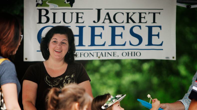 Angel King, owner of Blue Jacket Cheese, sells her products at an area farmer’s market. She and her husband own a dairy farm in Bellfontaine and they just won an award at the Ohio State Fair for their cheese. Jim Noelker/Dayton Daily News
