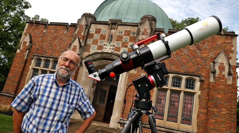 Former Wittenberg University astronomer Dan Fleisch in front of the University's Weaver Observatory Thursday, August 24, 2023. BILL LACKEY/STAFF