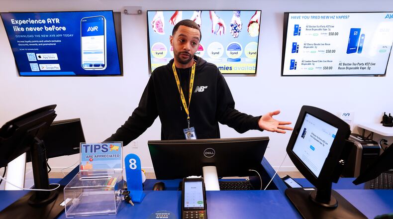 Tevin Johnson, manager of AYR Dispensary in Dayton talks Thursday, Sept. 2024 about the dispensary operators. MARSHALL GORBY\STAFF