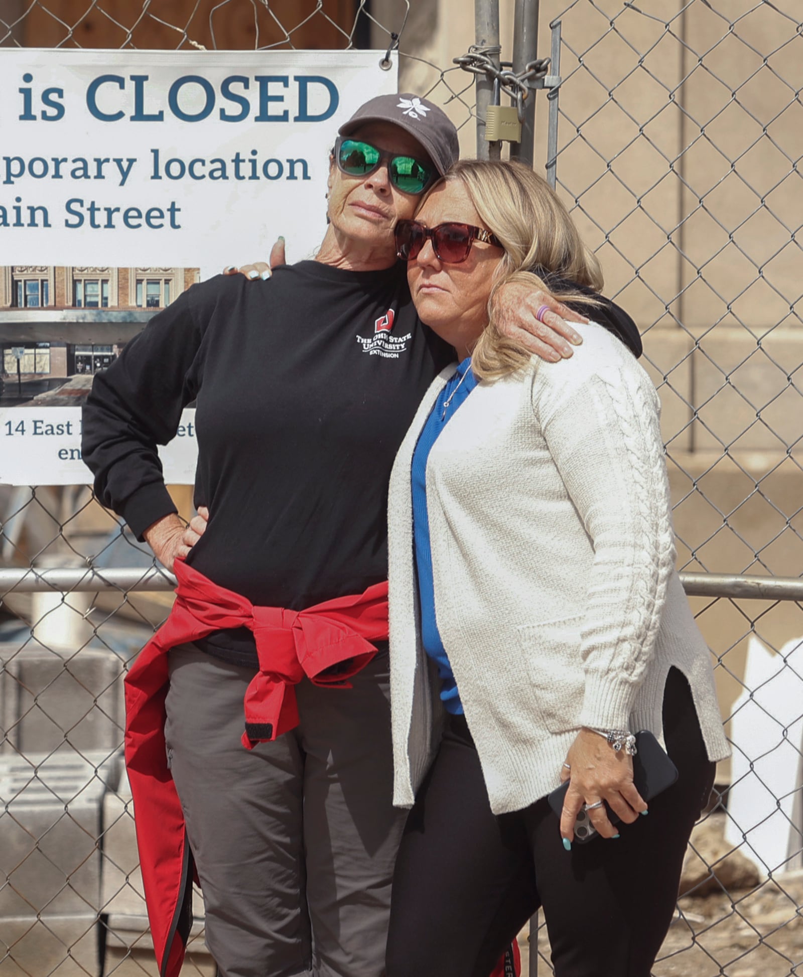 Pam Bennett, left, consoles Tracy Yates during the Public Safety Forces Day on Friday, May 2, 2025, near the Clark County Public Safety Memorial. Tracy's husband Clark County Sheriff's Deputy Matthew Yates was killed on the line of duty in 2022. JOSEPH COOKE/STAFF