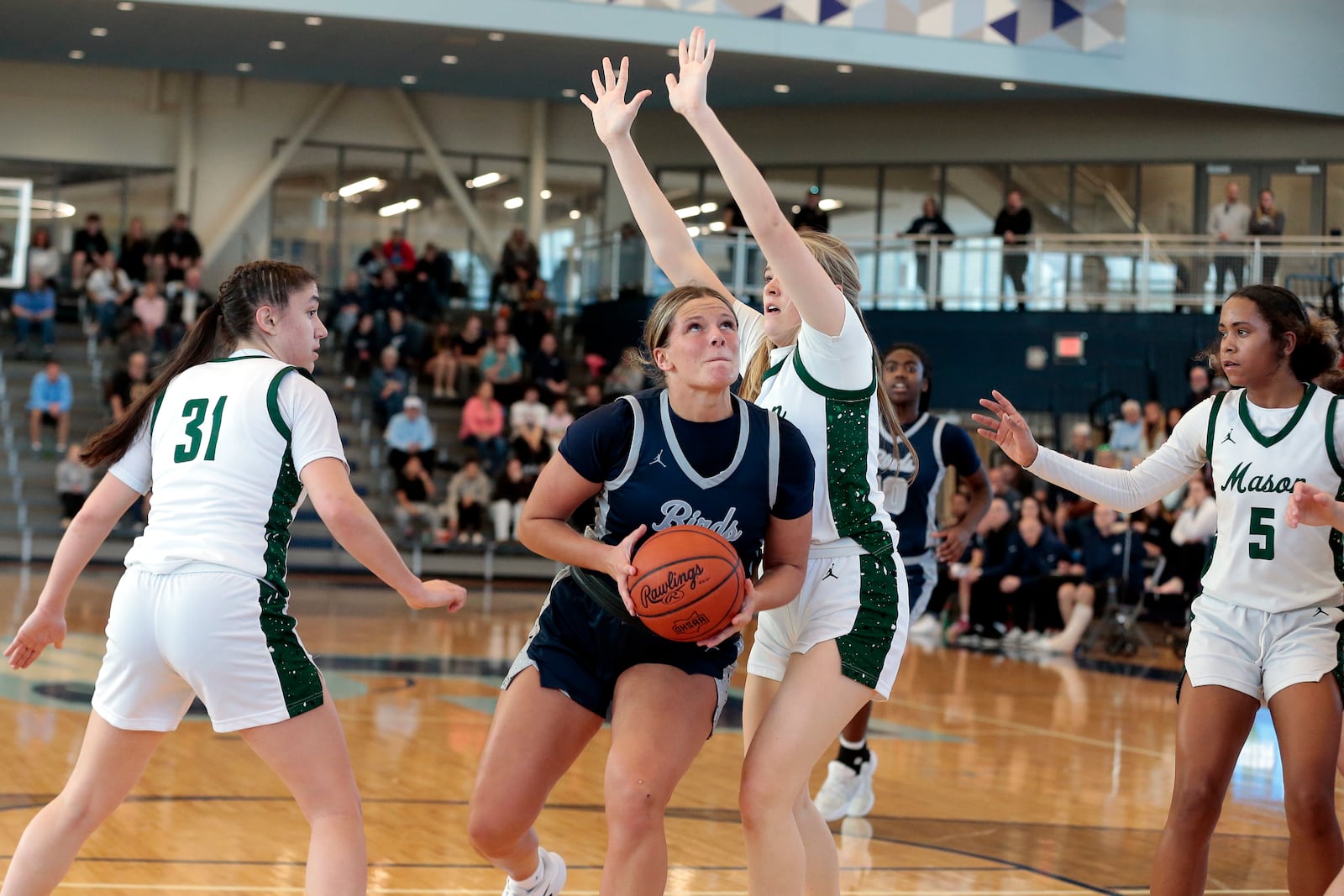 Fairmont senior Lena Buskard gets around the defense. Fairmont defeated Mason 61-31 in a Division I district championship game on Saturday, Feb. 28, 2026, in Fairborn. STEVEN WRIGHT / STAFF