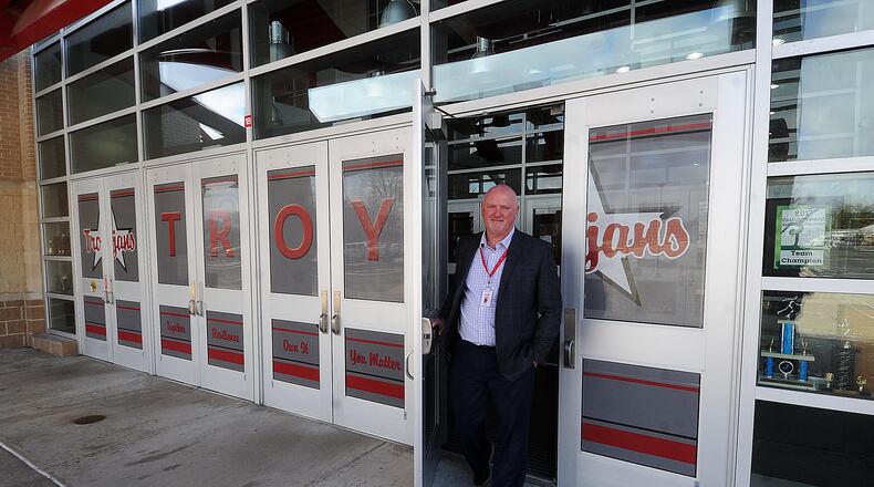 Troy schools Superintendent Chris Piper walks out the entrance of the high school Friday Feb. 3, 2023. MARSHALL GORBY\STAFF