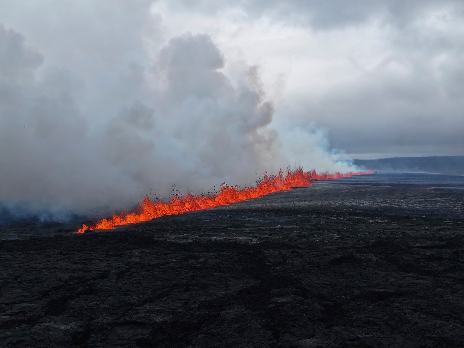 A view of the volcanic eruption by the Sundhnúkagigjarö íur volcano, in Grindavik, Iceland, Wednesday, July 16, 2025. (Department of Civil Protection and Emergency Management via AP)
