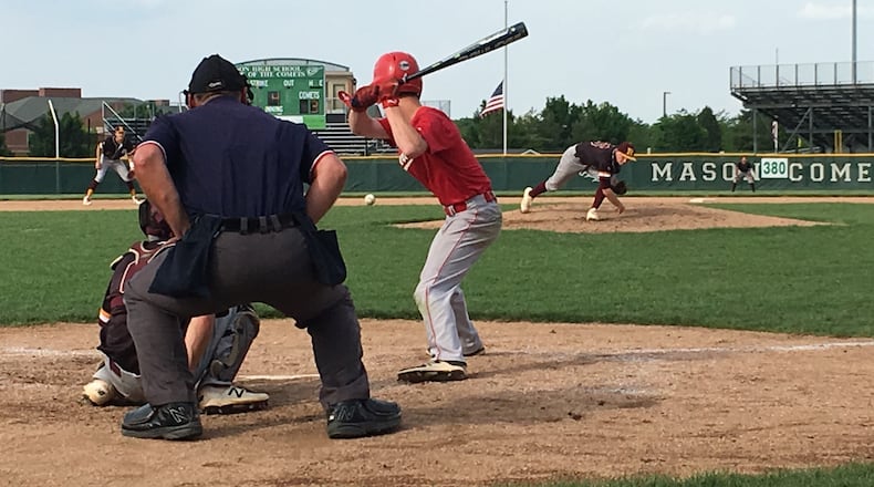 Ross pitcher Paul Schroeder delivers the ball toward Tippecanoe’s Miles McClurg (4) and RHS catcher Andrew Beebe in a 2018 Division II district final. RICK CASSANO/STAFF