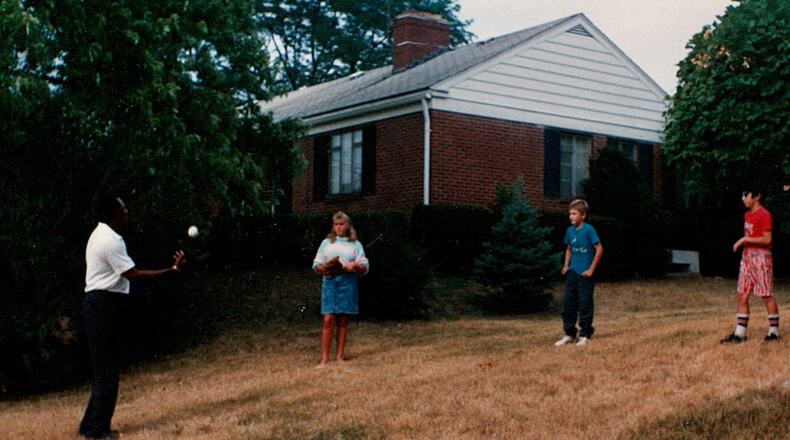 Minnesota Twins great Tony Oliva visits Kettering in 1988 and plays catch with David Jablonski, far right, and cousins. Photo by Mary Jablonski