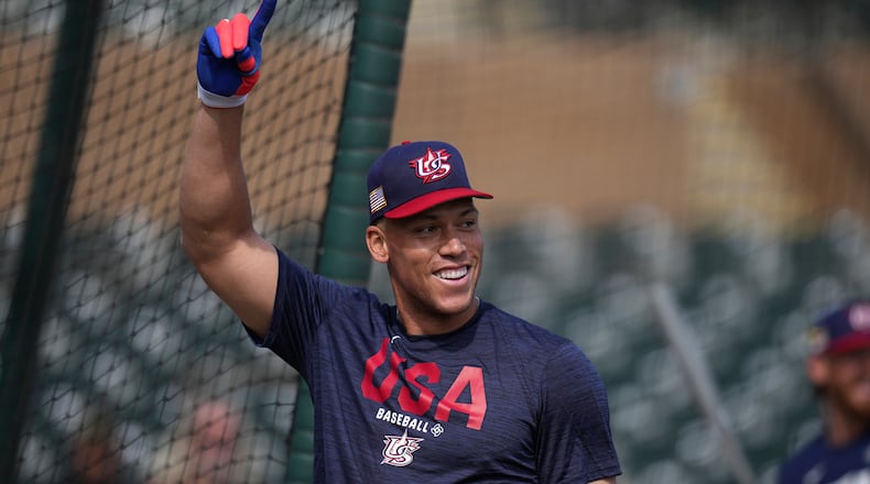 United States' Aaron Judge smiles while taking batting practice prior to an exhibition baseball game against the Colorado Rockies Wednesday, March 4, 2026, in Scottsdale, Ariz. (AP Photo/Ross D. Franklin)