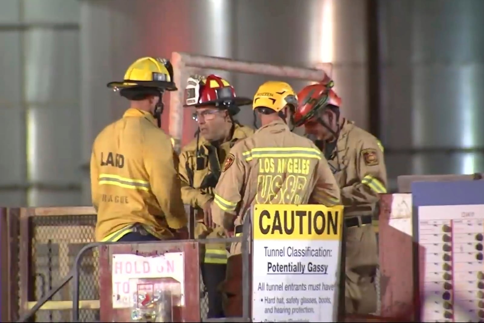This image taken from footage provided by KABC/ABC7 Los Angeles shows first responders working the scene after a tunnel collapsed on Wednesday, July 9, 2025, in Los Angeles. (KABC/ABC7 Los Angeles via AP)