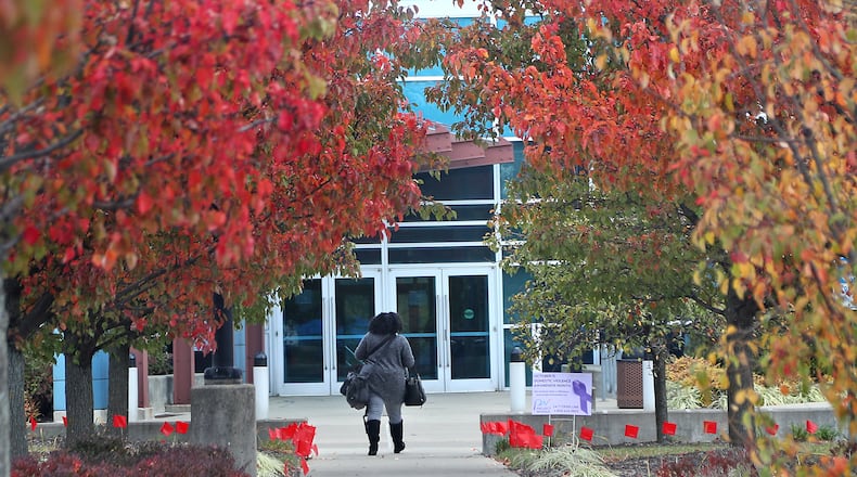 Clark State College was designated among the first group of Ohio institutions to earn the Ohio Reach Postsecondary Designation. In this file photo, a Clark State College student walked into a building on the Springfield campus last year. BILL LACKEY/STAFF