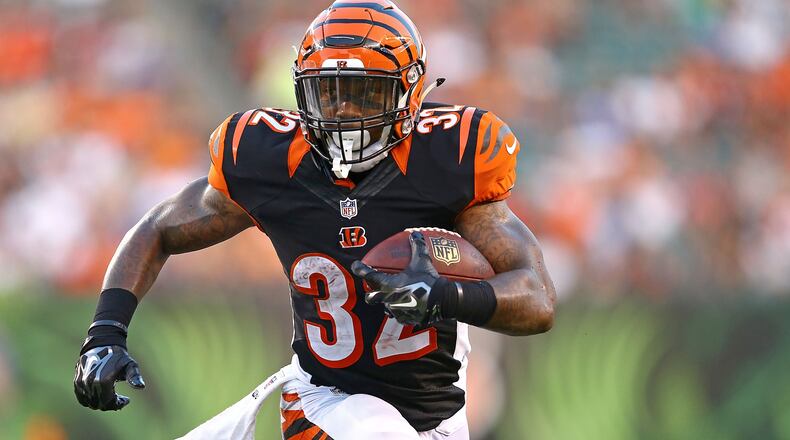 CINCINNATI, OH - AUGUST 28: Jeremy Hill #32 of the Cincinnati Bengals runs with the ball during the second quarter against the Indianapolis Colts at Paul Brown Stadium on August 28, 2014 in Cincinnati, Ohio. (Photo by Andy Lyons/Getty Images)