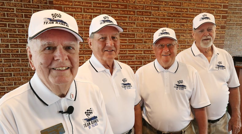 Jim Ingledue, of Springfield, and the rest of his “simulated” racing team, from left, Ron Guyer, from Dayton, Ed Gyenes, from Mansfield and Gary Barnes, from West Carolton, have gone to the Indy time trials and speed week for the past 30 years. Bill Lackey/Staff