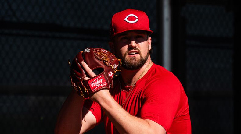 Cincinnati Reds pitcher Graham Ashcraft prepares to throw a pitch during the team's first workout of Spring Training for pitchers and catchers on Wednesday in Goodyear, Ariz. Cincinnati Reds photos