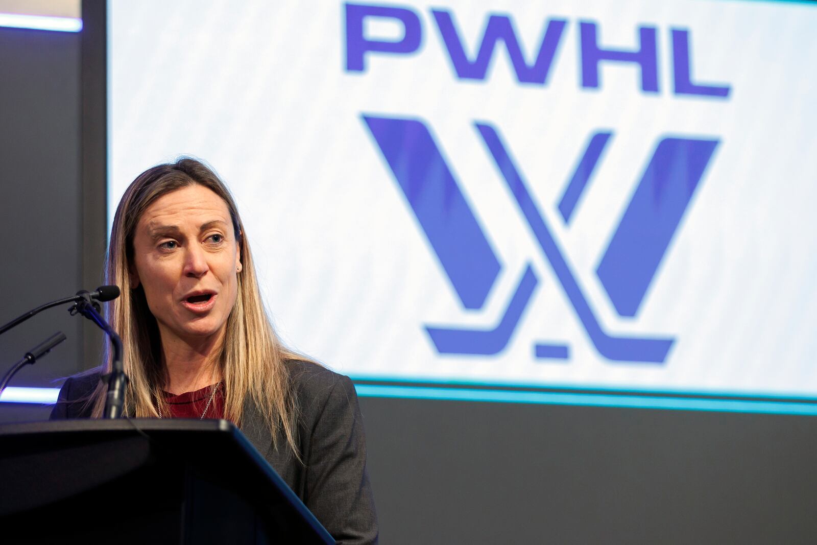 FILE - FILE - Professional Women's Hockey League senior vice president of hockey operations Jayna Hefford speaks before the PWHL Toronto team opened the Toronto Stock Exchange in Toronto, Jan. 12, 2024. (Cole Burston/The Canadian Press via AP, File, File)