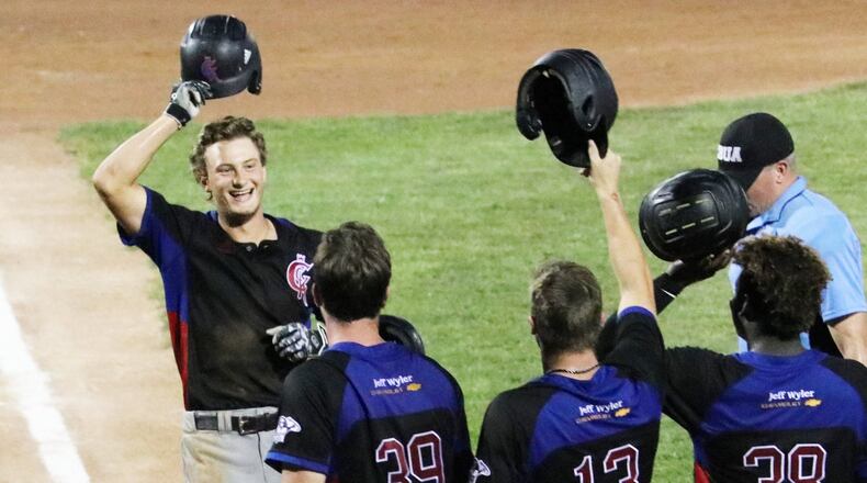 Champion City Kings infielder and Wright State University redshirt freshman Gehrig Anglin (left) celebrates after he hit a grand slam against Butler on July 4. It was Anglin’s second grand slam of the doubleheader, the first time that’s happened in team history. MICHAEL COOPER / CONTRIBUTED