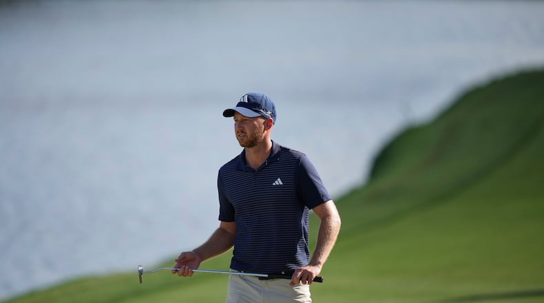 Daniel Berger walks up the 18th fairway during the second round of the Arnold Palmer Invitational at Bay Hill golf tournament Friday, March 6, 2026, in Orlando, Fla. (AP Photo/Matt Slocum)