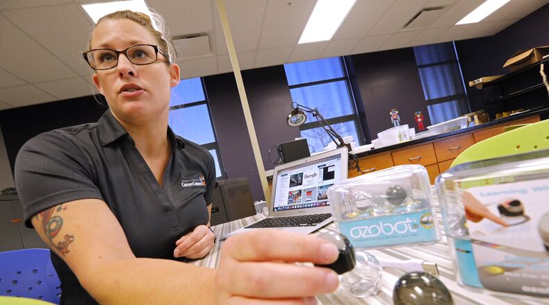 Rene Stratton, program coordinator at the Career Connect Ed Center, talks about the micro robots that the students will be controlling in the hour of code at The Dome. These events aim to get kids interested in coding and computer science. Bill Lackey/Staff