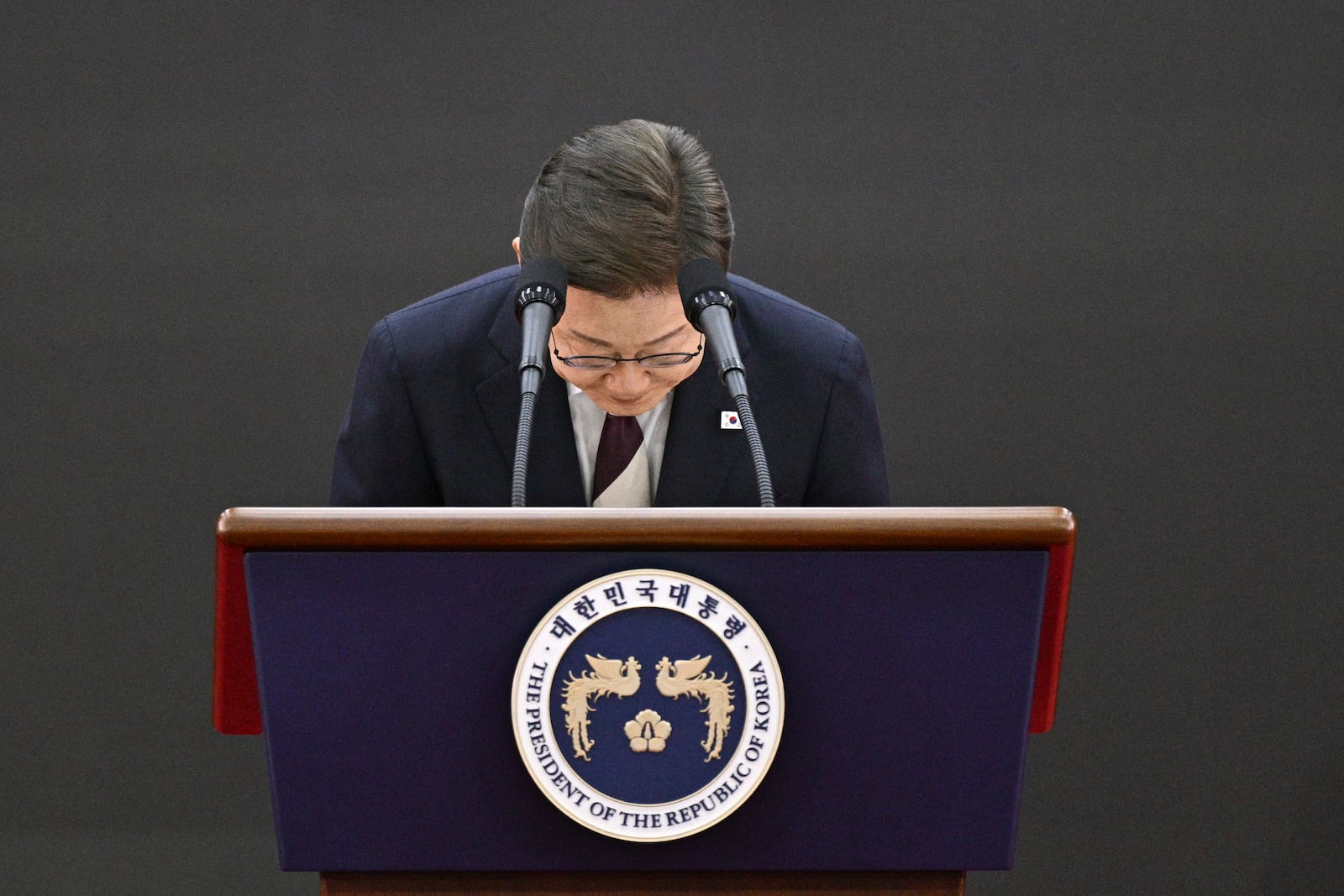 South Korea's President Lee Jae-myung bows as he delivers a speech after taking his oath during his inauguration ceremony at the National Assembly in Seoul on June 4, 2025. (Anthony Wallace/Pool Photo via AP)