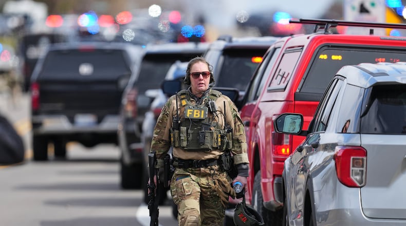 Law enforcement respond to a call at Temple Israel synagogue Thursday, March 12, 2026, in West Bloomfield Township, Mich. (AP Photo/Paul Sancya)