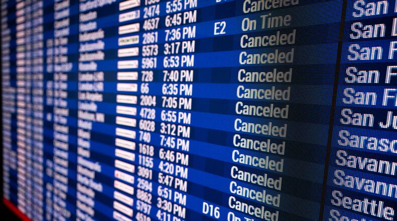 Rows of cancelled flights are displayed at the Philadelphia International Airport on Monday, Feb. 23, 2026 in Philadelphia. (AP Photo/Joe Lamberti)