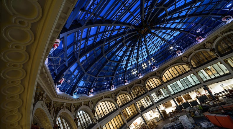 Construction continues to move closer to the finish line for Phase 1 of The Dayton Arcade redevelopment project in downtown Dayton. Up-lighting for the Rotunda Building’s 16 turkeys was recently installed as well as storefronts along the concourse. In the McCrory Building, lighting, carpeting and painting are nearing completion along with framing for the basement office pods. This space will be part of The Hub Powered by PNC, a joint venture of the University of Dayton and The Entrepreneurs Center. In The Arts Lofts at the Arcade, painting and light fixture installations continue to progress. Mantles and china cabinets, historic fixtures of the Arcade’s 4th Street apartment building are currently undergoing refinishing. The Arcade redevelopment project is a collaboration between lead developer Cross Street Partners, Model Group and McCormack Baron Salazar. For more information including leasing, visit arcadedayton.com. TOM GILLIAM / CONTRIBUTING PHOTOGRAPHER
