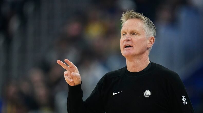 Golden State Warriors head coach Steve Kerr gestures during the first half of an NBA basketball game against the Minnesota Timberwolves, Friday, Dec. 12, 2025, in San Francisco. (AP Photo/Godofredo A. Vásquez)