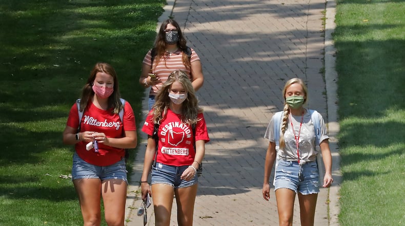 Wittenberg University students walk across campus on Aug. 26, 2020. The university will run an on-campus COVID-19 vaccination clinic for students from 9:30 a.m. until 3 p.m. on Thursday in the University’s Health, Wellness and Athletics Complex. BILL LACKEY/STAFF