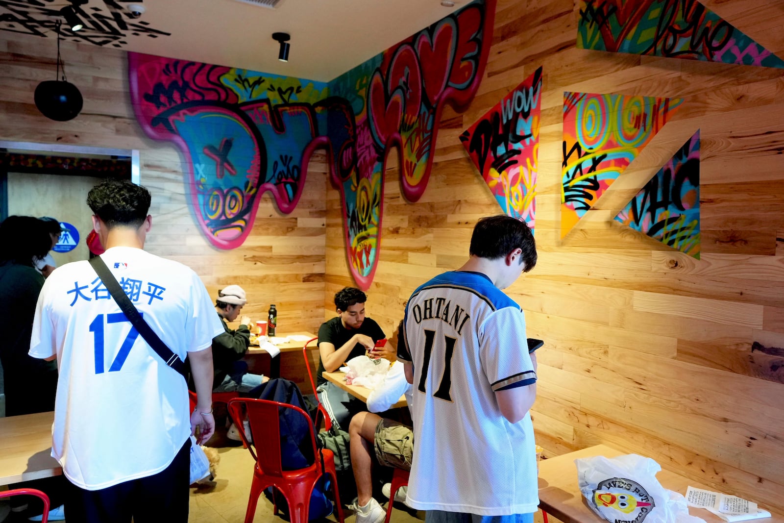 The Dave's Hot Chicken restaurant is seen in the Little Tokyo district of Los Angeles Monday, June 2, 2025. (AP Photo/Damian Dovarganes)