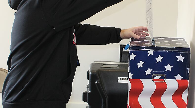 Four candidates seek two seats on the Mad River Twp. trustees board. JEFF GUERINI/STAFF