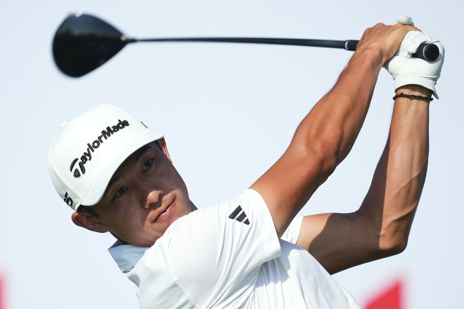 Collin Morikawa hits from the 18th tee during the first round of the Rocket Classic golf tournament at the Detroit Golf Club, Thursday, June 26, 2025, in Detroit. (AP Photo/Paul Sancya)