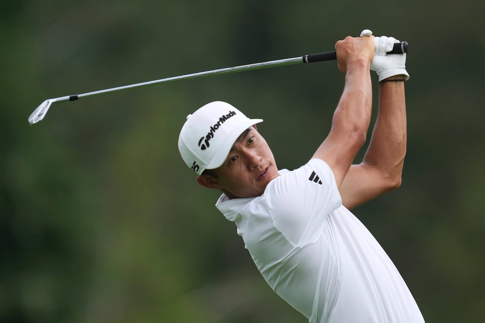 Collin Morikawa hits from the ninth tee during the first round of the Rocket Classic golf tournament at the Detroit Golf Club, Thursday, June 26, 2025, in Detroit. (AP Photo/Paul Sancya)