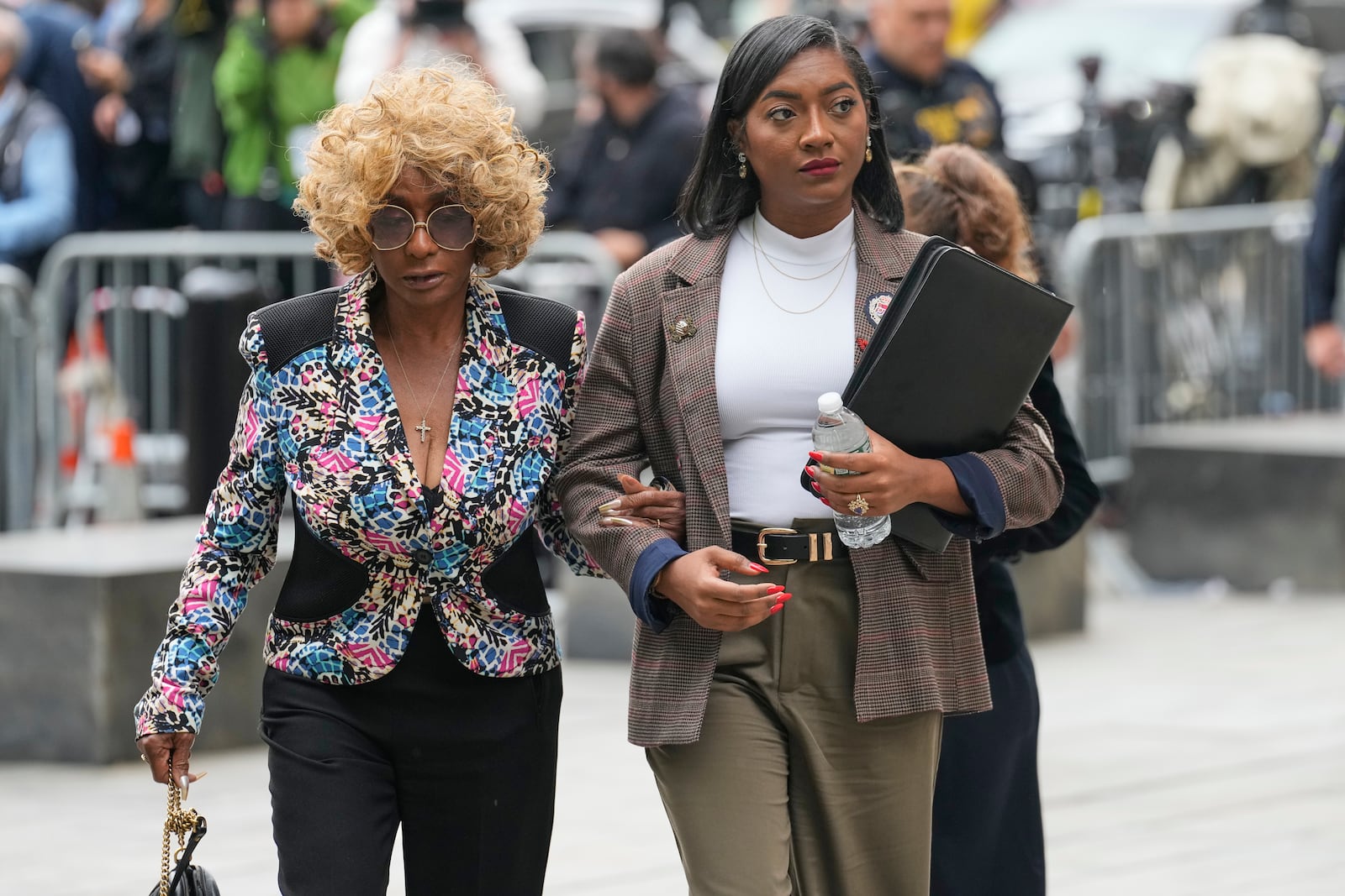 Janice Combs, mother of Sean Diddy Combs, left, arrives at Manhattan federal court, Tuesday, May 13, 2025, in New York. (AP Photo/Seth Wenig)