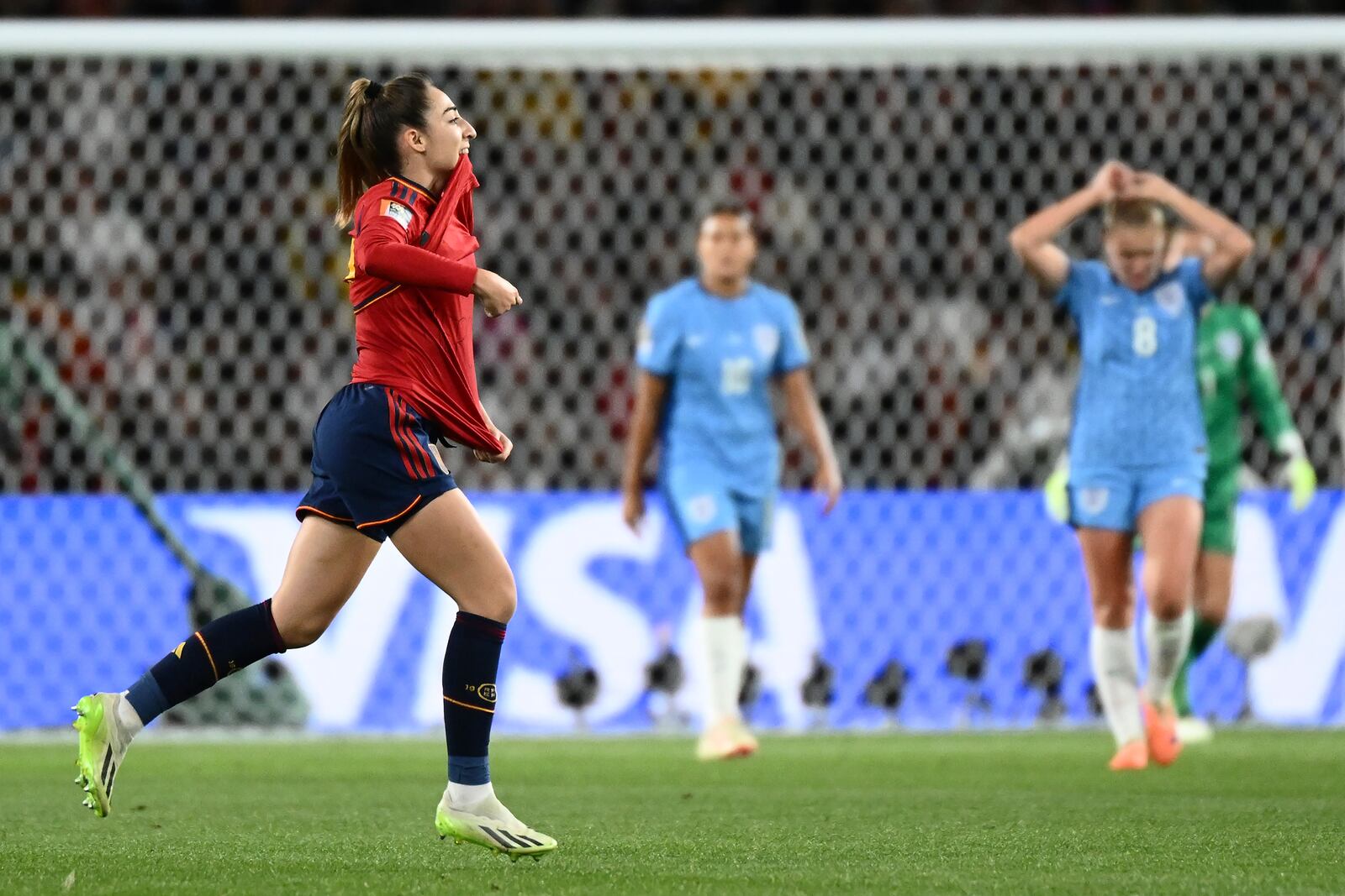 FILE - Spain's Olga Carmona, left, celebrates after scoring the opening goal during the Women's World Cup soccer final between Spain and England at Stadium Australia in Sydney, Australia, Sunday, Aug. 20, 2023. (AP Photo/Steve Markham, File)