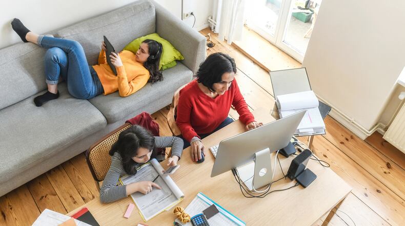 A big rule of survival for a busy household is to get events and plans on the calendar. Consider a giant wall calendar and a stash of highlighters to map out the week. ISTOCK