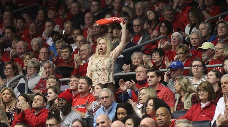 A Dayton fan cheers during a game against Saint Louis on Saturday, Feb. 23, 2019, at UD Arena. David Jablonski/Staff