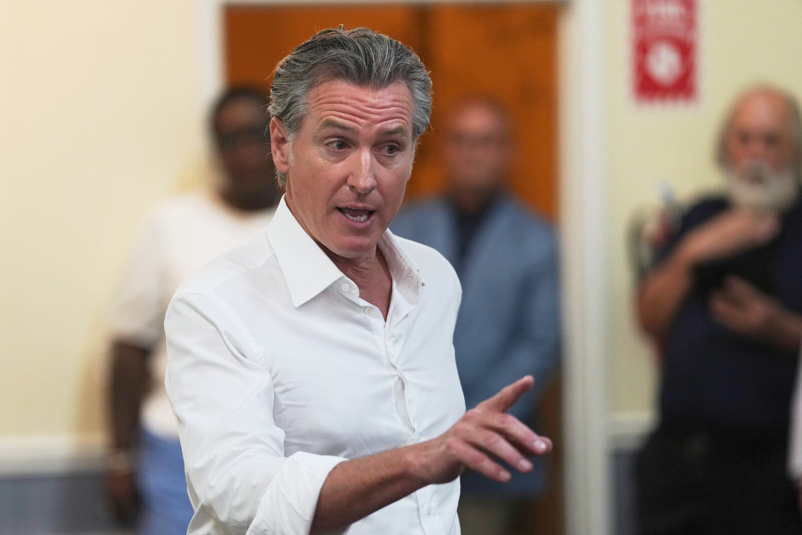 Gov. Gavin Newsom, R-Calif., speaks to a crowd gathered at an event space during a two-day swing through South Carolina on Tuesday, July 8, 2025, in Bennettsville, S.C. (AP Photo/Meg Kinnard)