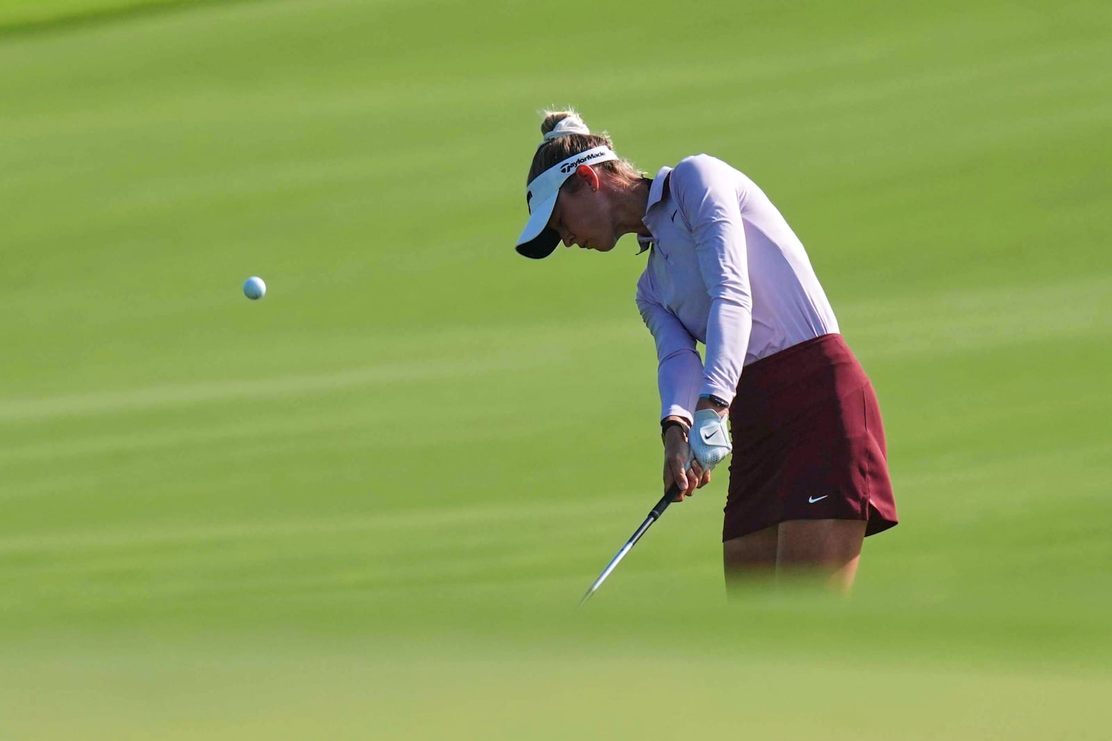 Nelly Korda hits to the third green during the first round of the Women's PGA Championship golf tournament, Thursday, June 19, 2025, in Frisco, Texas. (AP Photo/LM Otero)
