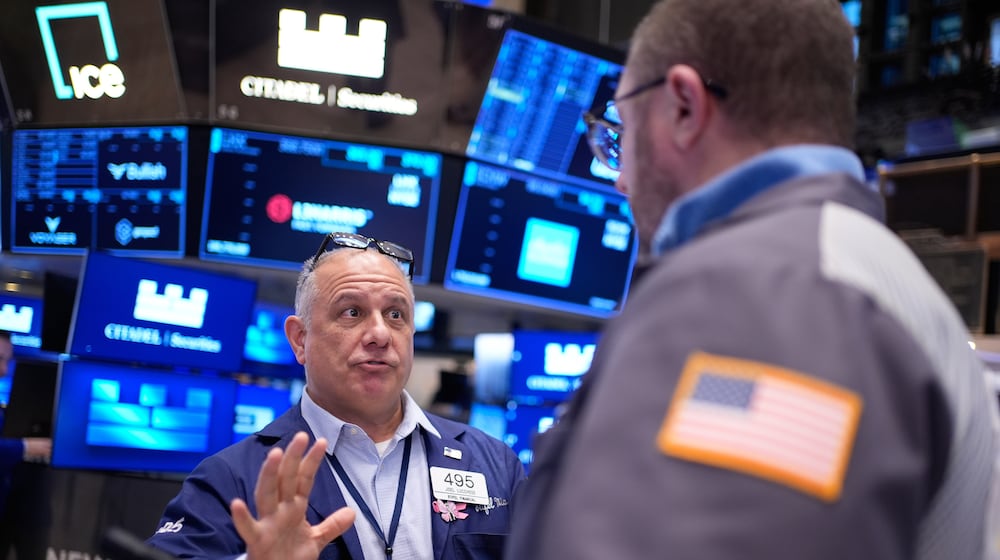 Joel Lucchese works on the floor at the New York Stock Exchange in New York, Thursday, March 5, 2026. (AP Photo/Seth Wenig)