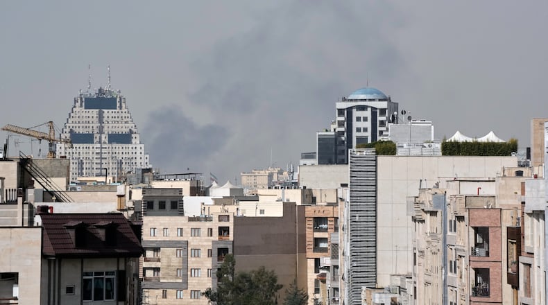 Smoke rises on the skyline after an explosion in Tehran, Iran, Saturday, Feb. 28, 2026.(AP Photo/Vahid Salemi)