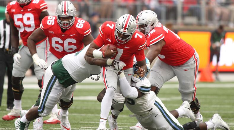 Ohio State’s Dwayne Haskins runs against Tulane on Saturday, Sept. 22, 2018, at Ohio Stadium in Columbus. David Jablonski/Staff