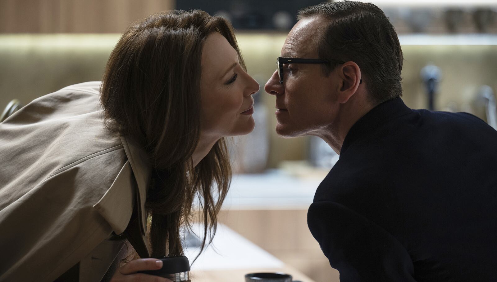 This image released by Focus Features shows Cate Blanchett, left, and Michael Fassbender in a scene from "Black Bag," a film written by David Koepp. (Claudette Barius/Focus Features via AP)