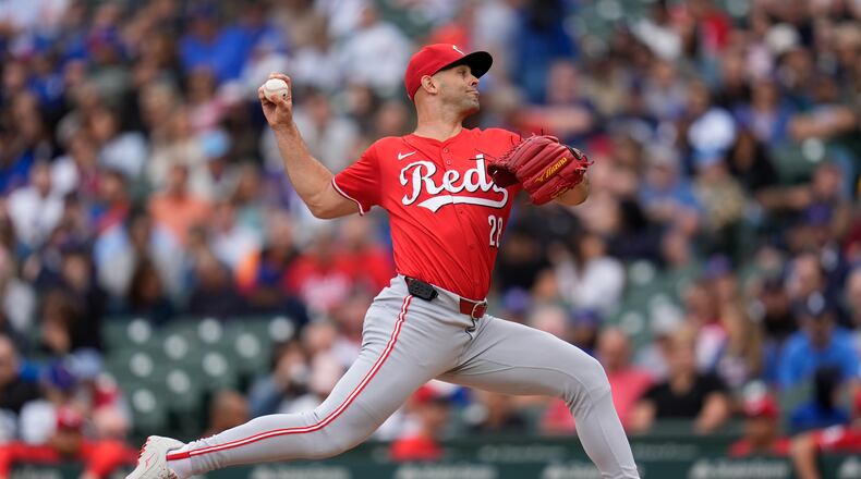 Cincinnati Reds starting pitcher Nick Martinez throws against the Chicago Cubs during the first inning of a baseball game Friday, Sept. 27, 2024, in Chicago. (AP Photo/Erin Hooley)