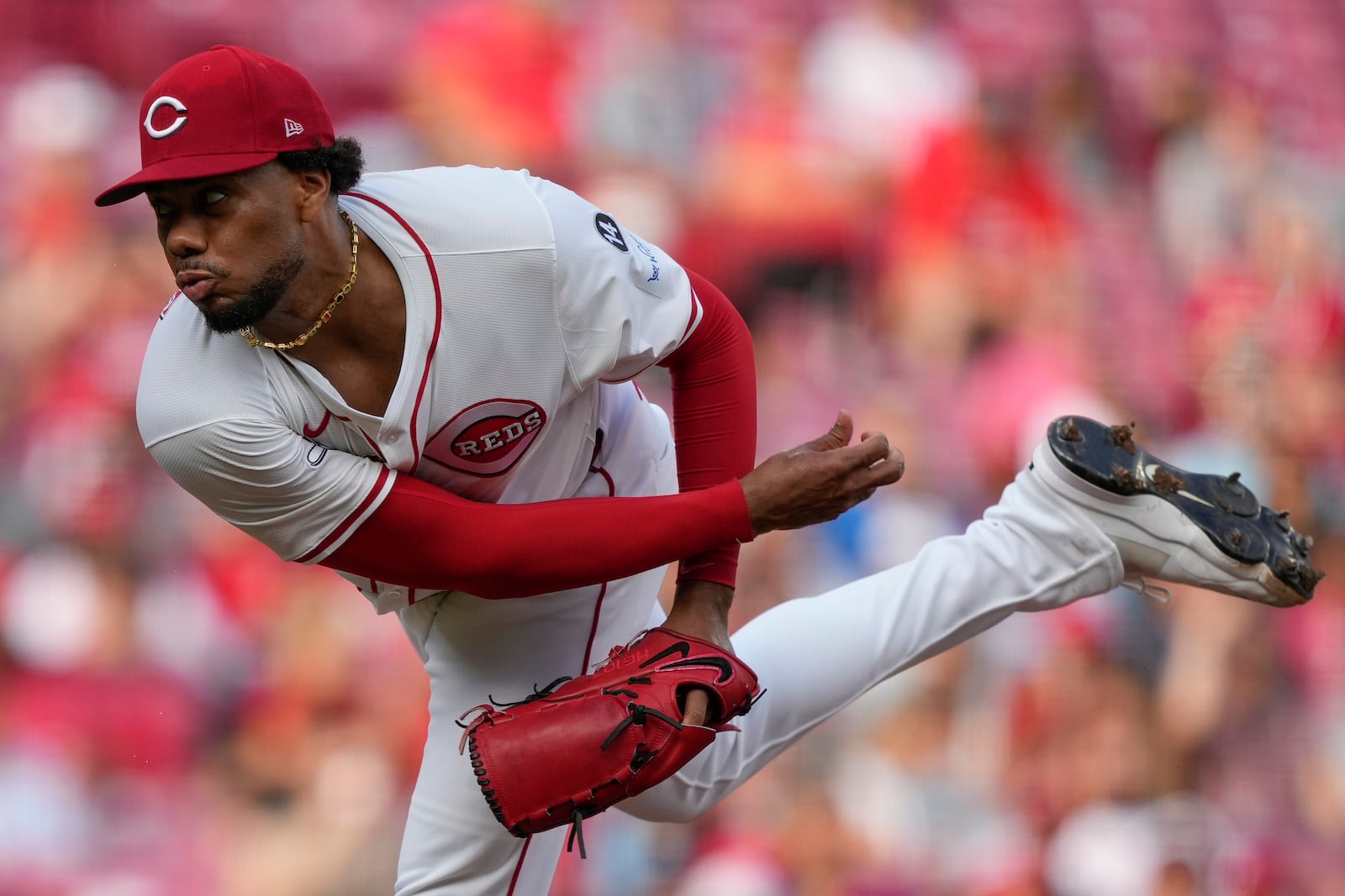 Cincinnati Reds pitcher Hunter Greene throws during the second inning of a baseball game against the Philadelphia Phillies Wednesday, Aug. 13, 2025, in Cincinnati. (AP Photo/Carolyn Kaster)
