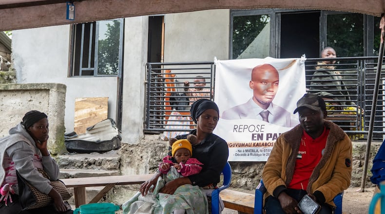 People attend a memorial for Nguvumali Kalabosh Bosco, who died when tunnels collapsed at a major coltan mining site due to landslides, in Goma, eastern Congo, Monday, Feb. 2, 2026. (AP Photo/Moses Sawasawa)