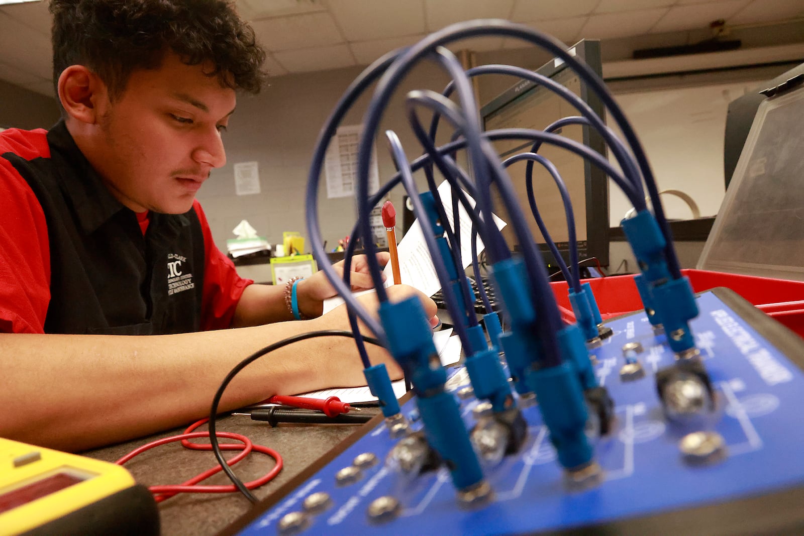 Steven Lopez Ramirez, senior, Springfield High School, a CTC students in the Automotive Technology & Motorcycle Maintenance program, Friday, Oct. 18, 2024. BILL LACKEY/STAFF